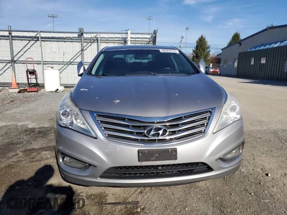 2013 Hyundai Azera с VIN KMHFG4JGXDA240841, выставлен на аукционе Copart как лот 82084474 с пробегом 168 746 миль миль и Списание • Salvage title. История ставок и продаж доступна на DreamBid. Изображение 5.