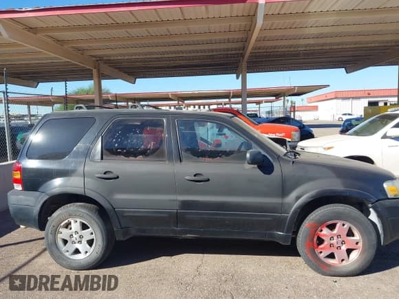✅ 2007 Ford Escape Limited • VIN: 1FMCU04137KA13520 • Lot: 43419709. Listed on IAAI with 238,111 mi. Free auction sales archive from the USA and detailed vehicle history report at DreamBid. Image 13.