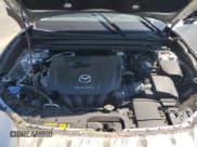 ✅ 2021 Mazda CX-30 Preferred • VIN: 3MVDMBCL3MM209970 • Lot: 68560295. Wystawiony na Copart z przebiegiem 49 195 mil. Bezpłatny archiwum sprzedaży aukcyjnych z USA i szczegółowy raport historii pojazdu na DreamBid. Zdjęcie 12.