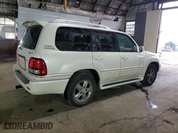 ✅ 2006 Lexus LX 470 • VIN: JTJHT00W464015842 • Lot: 66004384. Listed on Copart with 104,402 mi. Free auction sales archive from the USA and detailed vehicle history report at DreamBid. Image 3.