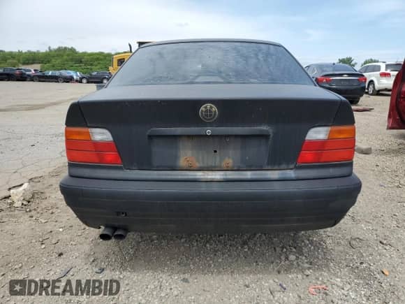 1998 BMW 3 Series 328i with VIN WBACD4329WAV60069, listed as a Copart auction lot 57724115 with 113,414 mi miles and Clean title. Bid and sale history available at DreamBid. Image 6.