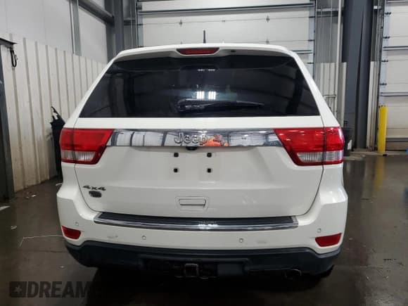 ✅ 2012 Jeep Grand Cherokee Overland • VIN: 1C4RJFCG7CC324310 • Lot: 84262345. Listed on Copart with 155,354 mi. Free auction sales archive from the USA and detailed vehicle history report at DreamBid. Image 6.