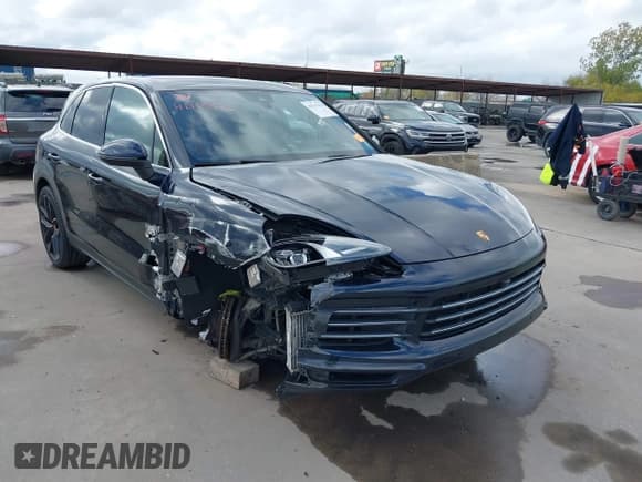 ✅ 2022 Porsche Cayenne E-Hybrid • VIN: WP1AE2AYXNDA26559 • Lot: 41113313. Listed on IAAI with 28,591 mi. Free auction sales archive from the USA and detailed vehicle history report at DreamBid. Image 1.