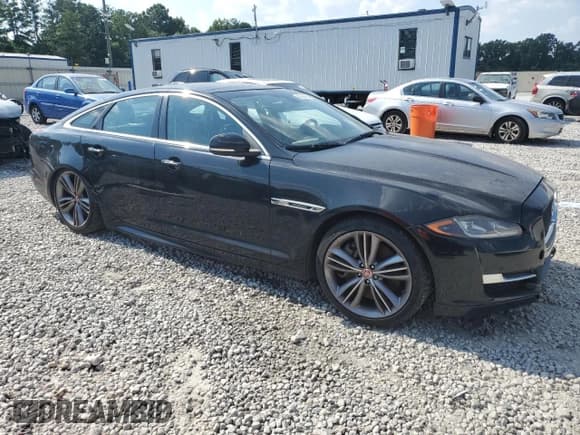 ✅ 2016 Jaguar XJ • VIN: SAJWA1CE1GMW00258 • Лот: 63584365. Опубликован ранее на Copart с пробегом 128 057 миль. Бесплатный доступ к архиву аукционных продаж из США и подробный отчёт об истории автомобиля на DreamBid. Изображение 4.