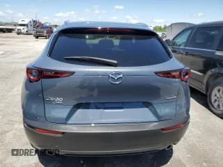 ✅ 2022 Mazda CX-30 S Carbon Edition • VIN: 3MVDMBCL4NM440622 • Lot: 54257654. Wystawiony na Copart z przebiegiem 7 533 mil. Bezpłatny archiwum sprzedaży aukcyjnych z USA i szczegółowy raport historii pojazdu na DreamBid. Zdjęcie 6.
