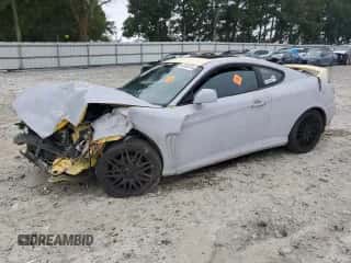 2004 Hyundai Tiburon GT с VIN KMHHN65F94U153085, выставлен на аукционе Copart как лот 65896785 с пробегом Не указан миль и Списание • Salvage title. История ставок и продаж доступна на DreamBid. Изображение 1.