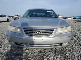 2006 Hyundai Azera SE с VIN KMHFC46F96A037972, выставлен на аукционе Copart как лот 61035765 с пробегом 140 857 миль миль и Списание • Salvage title. История ставок и продаж доступна на DreamBid. Изображение 5.