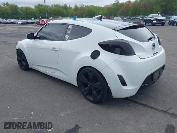 ✅ 2012 Hyundai Veloster w/Gray Int • VIN: KMHTC6AD6CU021176 • Lot: 42205695. Wystawiony na IAAI z przebiegiem 93 665 mil. Bezpłatny archiwum sprzedaży aukcyjnych z USA i szczegółowy raport historii pojazdu na DreamBid. Zdjęcie 3.