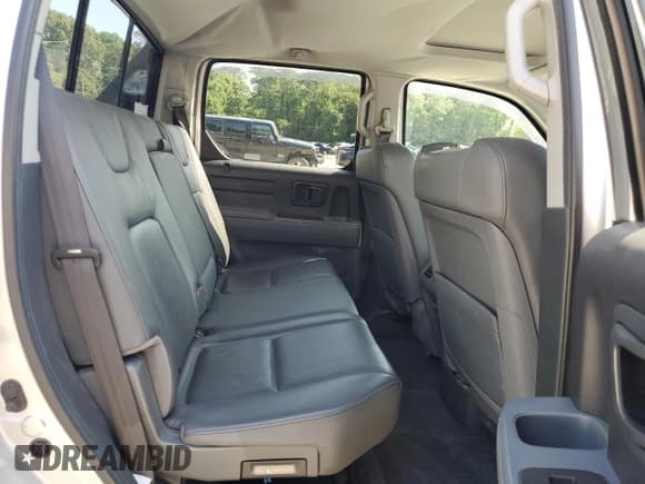 ✅ 2007 Honda Ridgeline RTL • VIN: 2HJYK16557H524381 • Lot: 59110995. Listed on Copart with 170,634 mi. Free auction sales archive from the USA and detailed vehicle history report at DreamBid. Image 10.