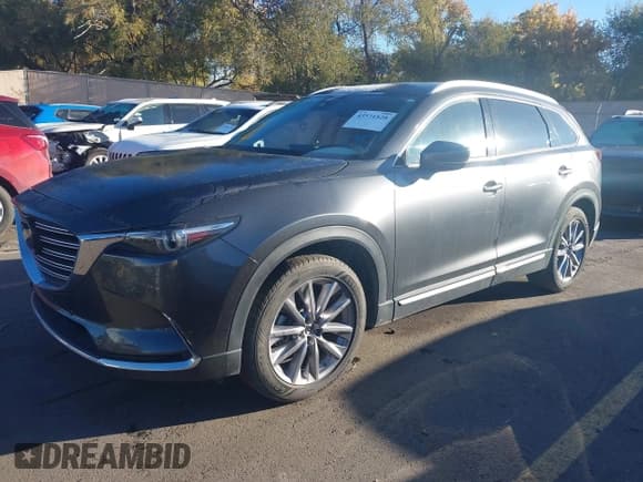 ✅ 2023 Mazda CX-9 Carbon Edition • VIN: JM3TCBDY9P0631587 • Lot: 43571828. Listed on IAAI with 62,854 mi. Free auction sales archive from the USA and detailed vehicle history report at DreamBid. Image 17.