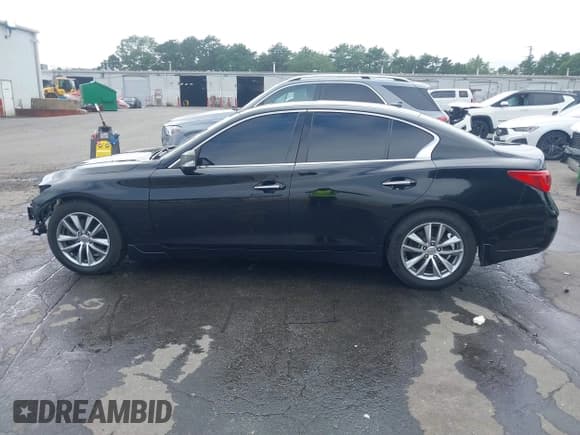 ✅ 2014 Infiniti Q50 • VIN: JN1BV7AP1EM677429 • Lot: 42656857. Listed on IAAI with 168,519 mi. Free auction sales archive from the USA and detailed vehicle history report at DreamBid. Image 15.