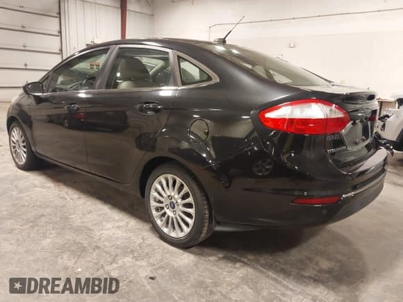 ✅ 2014 Ford Fiesta Titanium • VIN: 3FADP4CJ8EM131230 • Lot: 43712533. Wystawiony na IAAI z przebiegiem 105 396 mil. Bezpłatny archiwum sprzedaży aukcyjnych z USA i szczegółowy raport historii pojazdu na DreamBid. Zdjęcie 3.