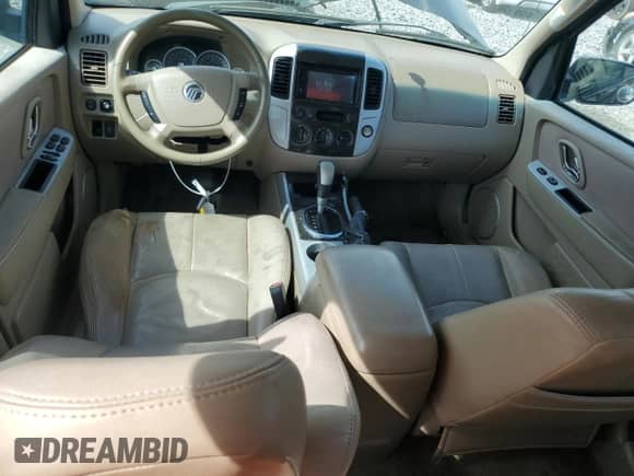 2006 Mercury Mariner Convenience z VIN 4M2YU56Z86DJ00448, wystawiony jako Copart lot #65950725 z przebiegiem 167 854 mil mil oraz Szkoda całkowita • Salvage title. Historia ofert i sprzedaży dostępna na DreamBid. Obrazek 8.