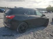 ✅ 2021 Chevrolet Equinox Premier • VIN: 2GNAXNEV6M6124943 • Lot: 84610695. Listed on Copart with 69,016 mi. Free auction sales archive from the USA and detailed vehicle history report at DreamBid. Image 3.