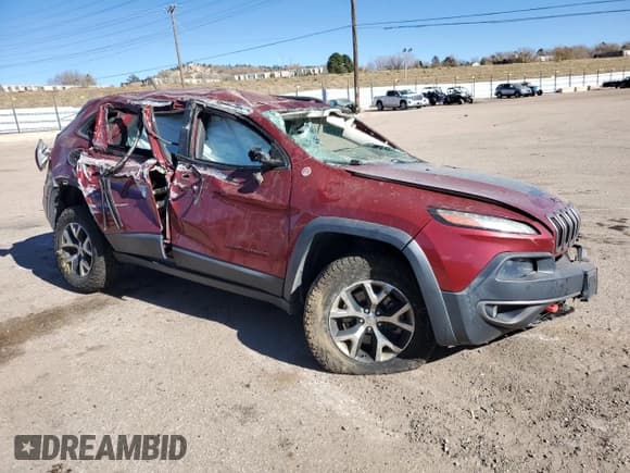 ✅ 2015 Jeep Cherokee Trailhawk • VIN: 1C4PJMBS4FW577590 • Lot: 92803025. Listed on Copart with 163,417 mi. Free auction sales archive from the USA and detailed vehicle history report at DreamBid. Image 4.