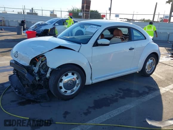 ✅ 2015 Volkswagen Beetle Fleet Edition • VIN: 3VWF17AT2FM604838 • Lot: 40814174. Listed on IAAI with Not provided. Free auction sales archive from the USA and detailed vehicle history report at DreamBid. Image 18.