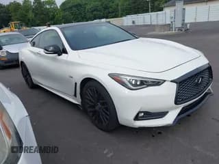 ✅ 2017 Infiniti Q60 Premium • VIN: JN1CV7EK6HM110415 • Lot: 42505421. Listed on IAAI with 201,630 mi. Free auction sales archive from the USA and detailed vehicle history report at DreamBid. Image 1.