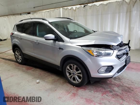 ✅ 2018 Ford Escape SE • VIN: 1FMCU9GDXJUA28926 • Лот: 92178195. Опубликован ранее на Copart с пробегом 99 452 миль. Бесплатный доступ к архиву аукционных продаж из США и подробный отчёт об истории автомобиля на DreamBid. Изображение 4.