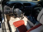 ✅ 2012 BMW 6 Series 650i xDrive • VIN: WBALZ5C50CDW99700 • Лот: 54983705. Опубликован ранее на Copart с пробегом Не указан. Бесплатный доступ к архиву аукционных продаж из США и подробный отчёт об истории автомобиля на DreamBid. Изображение 8.