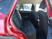 ✅ 2014 Mazda CX-5 Touring • VIN: JM3KE4CY1E0333406 • Lot: 43266877. Wystawiony na IAAI z przebiegiem 164 363 mil. Bezpłatny archiwum sprzedaży aukcyjnych z USA i szczegółowy raport historii pojazdu na DreamBid. Zdjęcie 8.