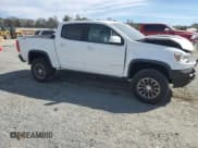 ✅ 2018 Chevrolet Colorado 4WD ZR2 • VIN: 1GCGTEEN8J1147993 • Lot: 89459035. Listed on Copart with 127,549 mi. Free auction sales archive from the USA and detailed vehicle history report at DreamBid. Image 4.