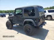 ✅ 2004 Jeep Wrangler Rubicon • VIN: 1J4FA69S74P769357 • Lot: 65425525. Wystawiony na Copart z przebiegiem 125 486 mil. Bezpłatny archiwum sprzedaży aukcyjnych z USA i szczegółowy raport historii pojazdu na DreamBid. Zdjęcie 2.