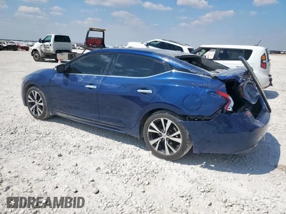 ✅ 2017 Nissan Maxima Platinum • VIN: 1N4AA6AP1HC385388 • Lot: 80297985. Listed on Copart with 98,923 mi. Free auction sales archive from the USA and detailed vehicle history report at DreamBid. Image 2.