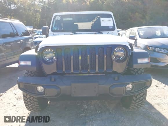 ✅ 2023 Jeep Wrangler Sport • VIN: 1C4GJXAG3PW699468 • Lot: 43322114. Listed on IAAI with 40,778 mi. Free auction sales archive from the USA and detailed vehicle history report at DreamBid. Image 12.