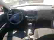 2007 Hyundai Accent GS with VIN KMHCM36C27U030166, listed as a Copart auction lot 67738154 with 174,856 mi miles and Salvage title. Bid and sale history available at DreamBid. Image 8.