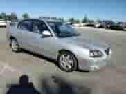 2005 Hyundai Elantra GLS z VIN KMHDN46D75U096046, wystawiony jako Copart lot #68332904 z przebiegiem 175 947 mil mil oraz Szkoda całkowita • Salvage title. Historia ofert i sprzedaży dostępna na DreamBid. Obrazek 10.