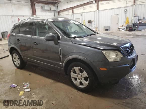 2013 Chevrolet Captiva Sport LS z VIN 3GNAL2EK7DS617127, wystawiony jako Copart lot #86716544 z przebiegiem 160 042 mil mil oraz Nie do naprawy • Non repairable. Historia ofert i sprzedaży dostępna na DreamBid. Obrazek 4.