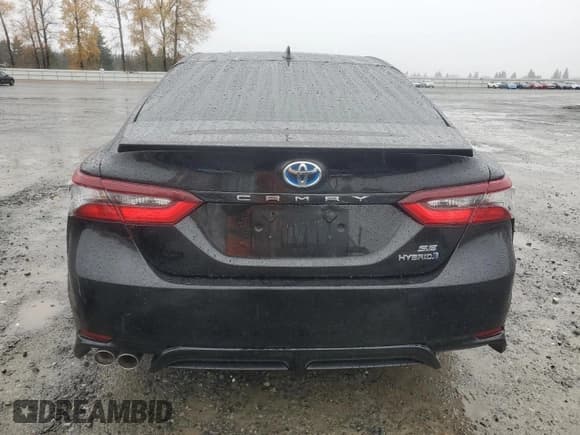 ✅ 2022 Toyota Camry Hybrid Nightshade • VIN: 4T1G31AK2NU576504 • Лот: 91945085. Опубликован ранее на Copart с пробегом 159 295 миль. Бесплатный доступ к архиву аукционных продаж из США и подробный отчёт об истории автомобиля на DreamBid. Изображение 6.
