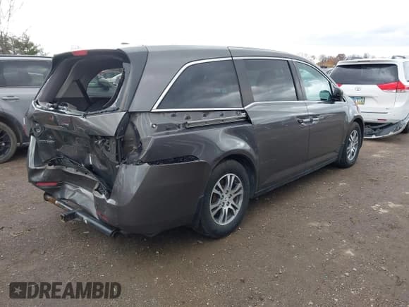 ✅ 2012 Honda Odyssey EX-L • VIN: 5FNRL5H61CB035527 • Lot: 43789118. Listed on IAAI with 163,426 mi. Free auction sales archive from the USA and detailed vehicle history report at DreamBid. Image 4.