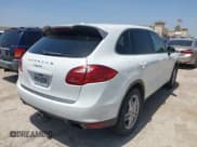 ✅ 2014 Porsche Cayenne • VIN: WP1AA2A21ELA93242 • Лот: 42762961. Опубликован ранее на IAAI с пробегом 99 017 миль. Бесплатный доступ к архиву аукционных продаж из США и подробный отчёт об истории автомобиля на DreamBid. Изображение 4.