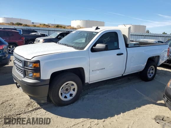 ✅ 2015 Chevrolet Silverado 1500 LS • VIN: 1GCNCPEH4FZ427271 • Лот: 76410034. Опубликован ранее на Copart с пробегом 286 089 миль. Бесплатный доступ к архиву аукционных продаж из США и подробный отчёт об истории автомобиля на DreamBid. Изображение 1.