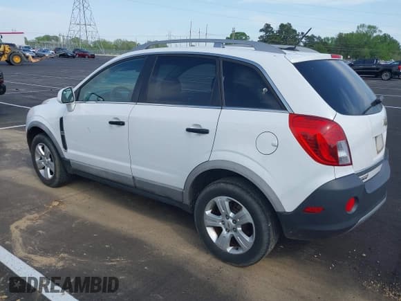 ✅ 2014 Chevrolet Captiva Sport LS • VIN: 3GNAL2EK0ES603331 • Lot: 42061441. Wystawiony na IAAI z przebiegiem 128 041 mil. Bezpłatny archiwum sprzedaży aukcyjnych z USA i szczegółowy raport historii pojazdu na DreamBid. Zdjęcie 3.