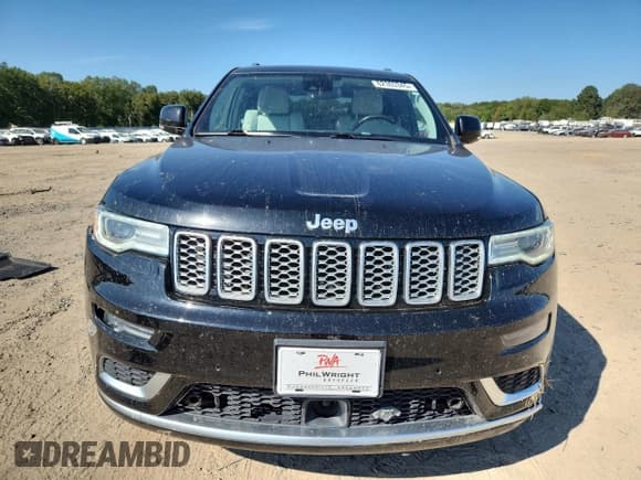 ✅ 2018 Jeep Grand Cherokee Summit • VIN: 1C4RJFJG4JC506708 • Lot: 82303345. Listed on Copart with 104,788 mi. Free auction sales archive from the USA and detailed vehicle history report at DreamBid. Image 5.