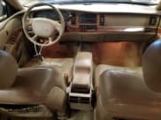 ✅ 1997 Buick Park Avenue • VIN: 1G4CW52K8V4633204 • Lot: 61240674. Listed on Copart with 102,263 mi. Free auction sales archive from the USA and detailed vehicle history report at DreamBid. Image 8.