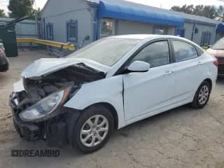 2012 Hyundai Accent GLS z VIN KMHCT4AEXCU253289, wystawiony jako Copart lot #84296065 z przebiegiem 96 331 mil mil oraz Szkoda całkowita • Salvage title. Historia ofert i sprzedaży dostępna na DreamBid. Obrazek 1.