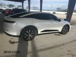 ✅ 2023 Toyota Crown XLE • VIN: JTDAAAAF6P3002841 • Лот: 75890694. Опубликован ранее на Copart с пробегом 41 533 миль. Бесплатный доступ к архиву аукционных продаж из США и подробный отчёт об истории автомобиля на DreamBid. Изображение 3.