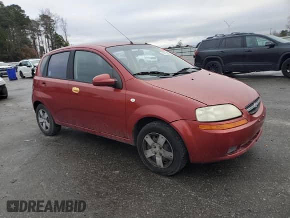 2007 Chevrolet Aveo LS z VIN KL1TD66627B686905, wystawiony jako Copart lot #85775504 z przebiegiem Nie podano mil oraz Szkoda całkowita • Salvage title. Historia ofert i sprzedaży dostępna na DreamBid. Obrazek 4.