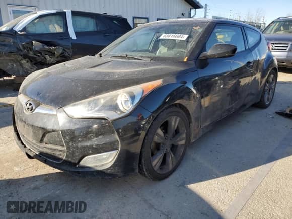 2012 Hyundai Veloster w/Red Int z VIN KMHTC6AD5CU030242, wystawiony jako Copart lot #83016604 z przebiegiem 142 555 mil mil oraz Szkoda całkowita • Salvage title. Historia ofert i sprzedaży dostępna na DreamBid. Obrazek 1.