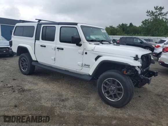 ✅ 2021 Jeep Gladiator Overland • VIN: 1C6HJTFGXML587325 • Lot: 64049285. Listed on Copart with 72,229 mi. Free auction sales archive from the USA and detailed vehicle history report at DreamBid. Image 4.