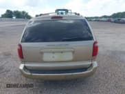 ✅ 2003 Dodge Caravan EX • VIN: 2D4GP74L03R104251 • Lot: 42747705. Listed on IAAI with 323,929 mi. Free auction sales archive from the USA and detailed vehicle history report at DreamBid. Image 16.