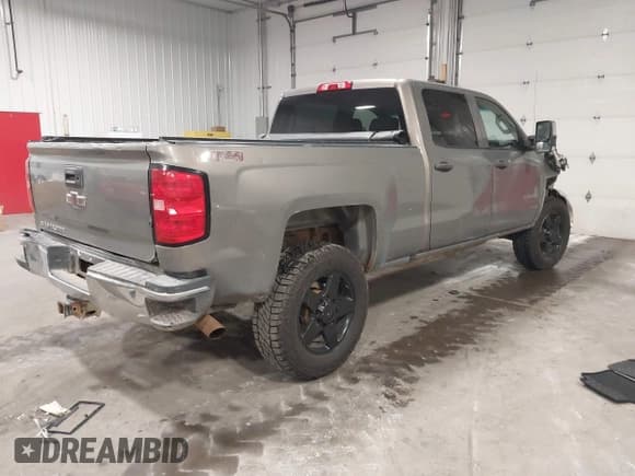 ✅ 2017 Chevrolet Silverado 2500HD Work Truck • VIN: 1GC1KUEG0HF128856 • Lot: 42046701. Listed on IAAI with 200,705 mi. Free auction sales archive from the USA and detailed vehicle history report at DreamBid. Image 4.