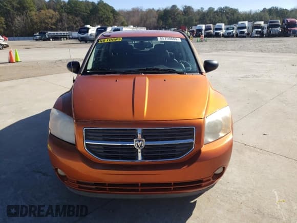 ✅ 2011 Dodge Caliber Mainstreet • VIN: 1B3CB3HA6BD221203 • Лот: 85759804. Опубликован ранее на Copart с пробегом 125 442 миль. Бесплатный доступ к архиву аукционных продаж из США и подробный отчёт об истории автомобиля на DreamBid. Изображение 5.