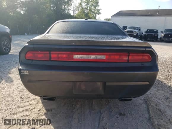 2014 Dodge Challenger SXT z VIN 2C3CDYAG4EH313829, wystawiony jako Copart lot #68274174 z przebiegiem Nie podano mil oraz Szkoda całkowita • Salvage title. Historia ofert i sprzedaży dostępna na DreamBid. Obrazek 6.