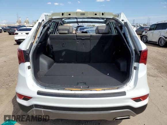 ✅ 2018 Hyundai Santa Fe 2.4L • VIN: 5NMZU3LB0JH063305 • Лот: 67851313. Опубликован ранее на Copart с пробегом 35 248 миль. Бесплатный доступ к архиву аукционных продаж из США и подробный отчёт об истории автомобиля на DreamBid. Изображение 6.