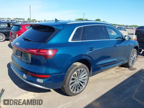 ✅ 2019 Audi e-tron Prestige • VIN: WA1VABGE0KB009718 • Lot: 42336983. Listed on IAAI with 54,871 mi. Free auction sales archive from the USA and detailed vehicle history report at DreamBid. Image 4.