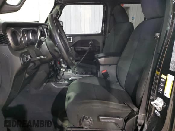 ✅ 2021 Jeep Gladiator Willys • VIN: 1C6HJTAG4ML556255 • Лот: 57143125. Опубликован ранее на Copart с пробегом 57 104 миль. Бесплатный доступ к архиву аукционных продаж из США и подробный отчёт об истории автомобиля на DreamBid. Изображение 7.